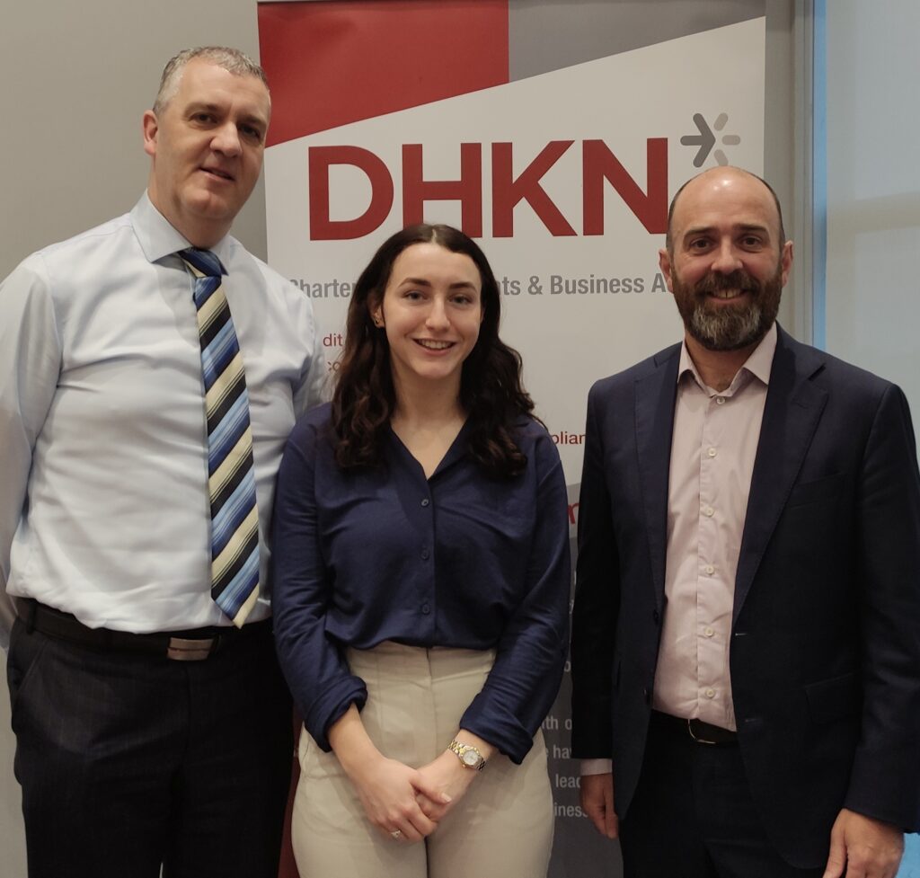 Libby Howard, an accounting trainee with DHKN, received the highest mark in Ireland in the ACCA Financial Reporting (FR) exam in December 2023, placing 8th in the world. Libby is pictured with Maurice O'Sullivan, Audit Director at DHKN and DHKN Partner Stephen Crowley.