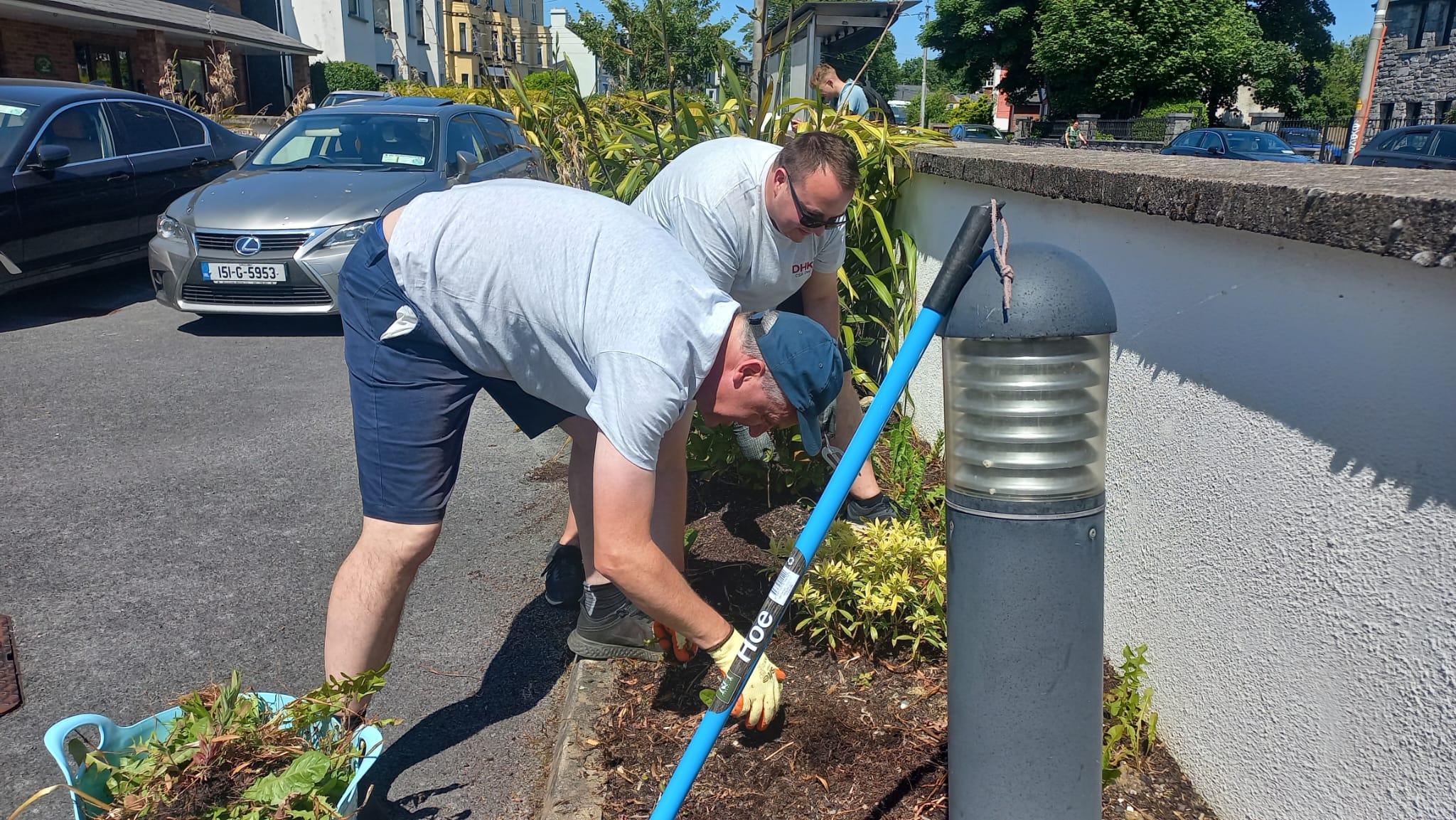 Mark Gibbs and George Alton hard at work at COPE Galway's Osterley Lodge shelter as part of DHKN's Community Action Day 2023